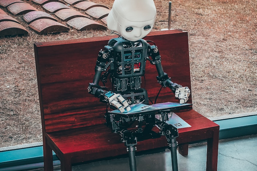 Humanoid AI agent working at a laptop